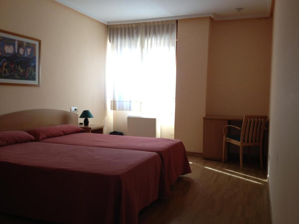 Apartamentos Turisticos Puerta De León Pokoj fotografie